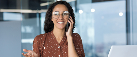 Businesswoman taking a call in an office