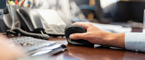 Person Using a Computer Mouse