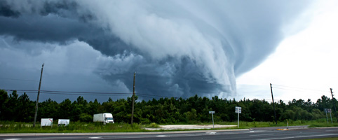 Tornado about to touch down over a forest