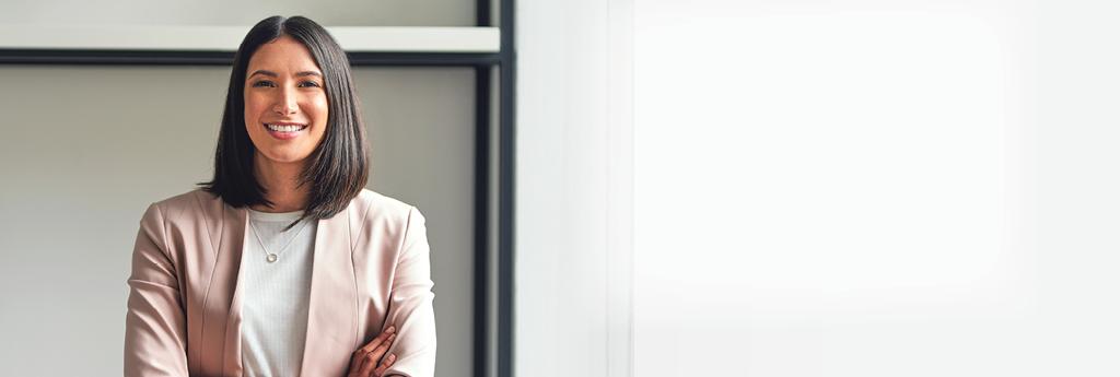woman smiling in blazer | CNA Insurance