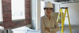 Construction worker working indoors