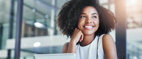 Woman smiling in office | CNA Insurance