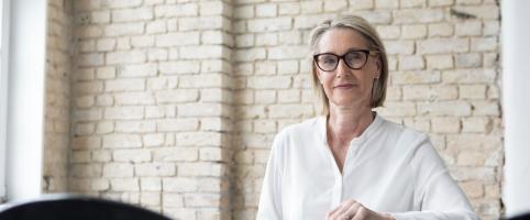 Woman sitting at a desk in an office